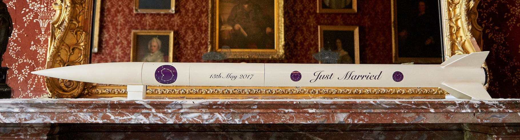 Just Marries Rocket on ornate mantlepiece